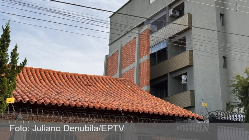 Muro gigante de casa que bloqueia visão de prédio ao lado em MG viraliza nas redes; conheça história